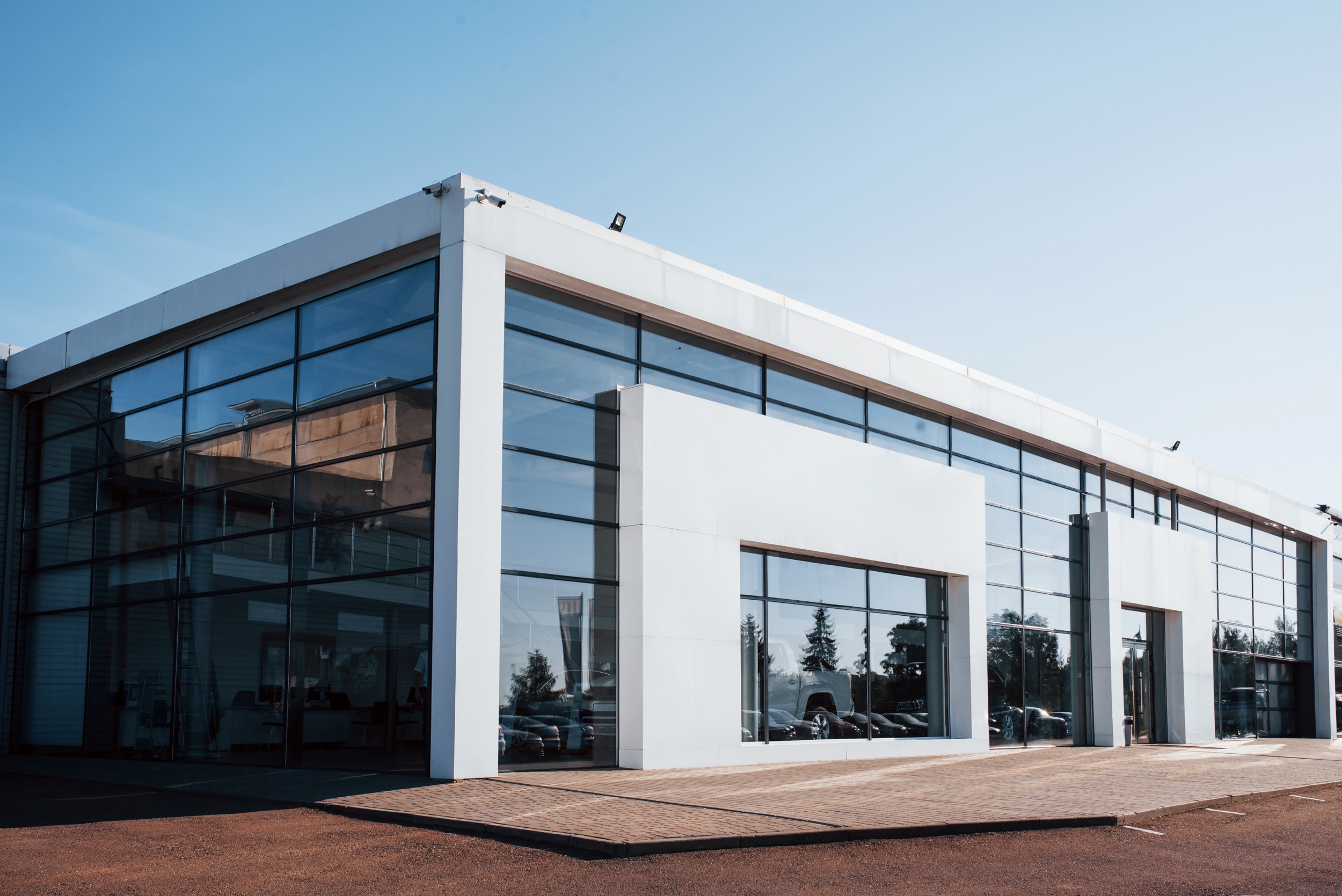 modern-car-building-many-vehicles-inside-sunny-d-2023-11-27-04-58-06-utcResized.jpg
